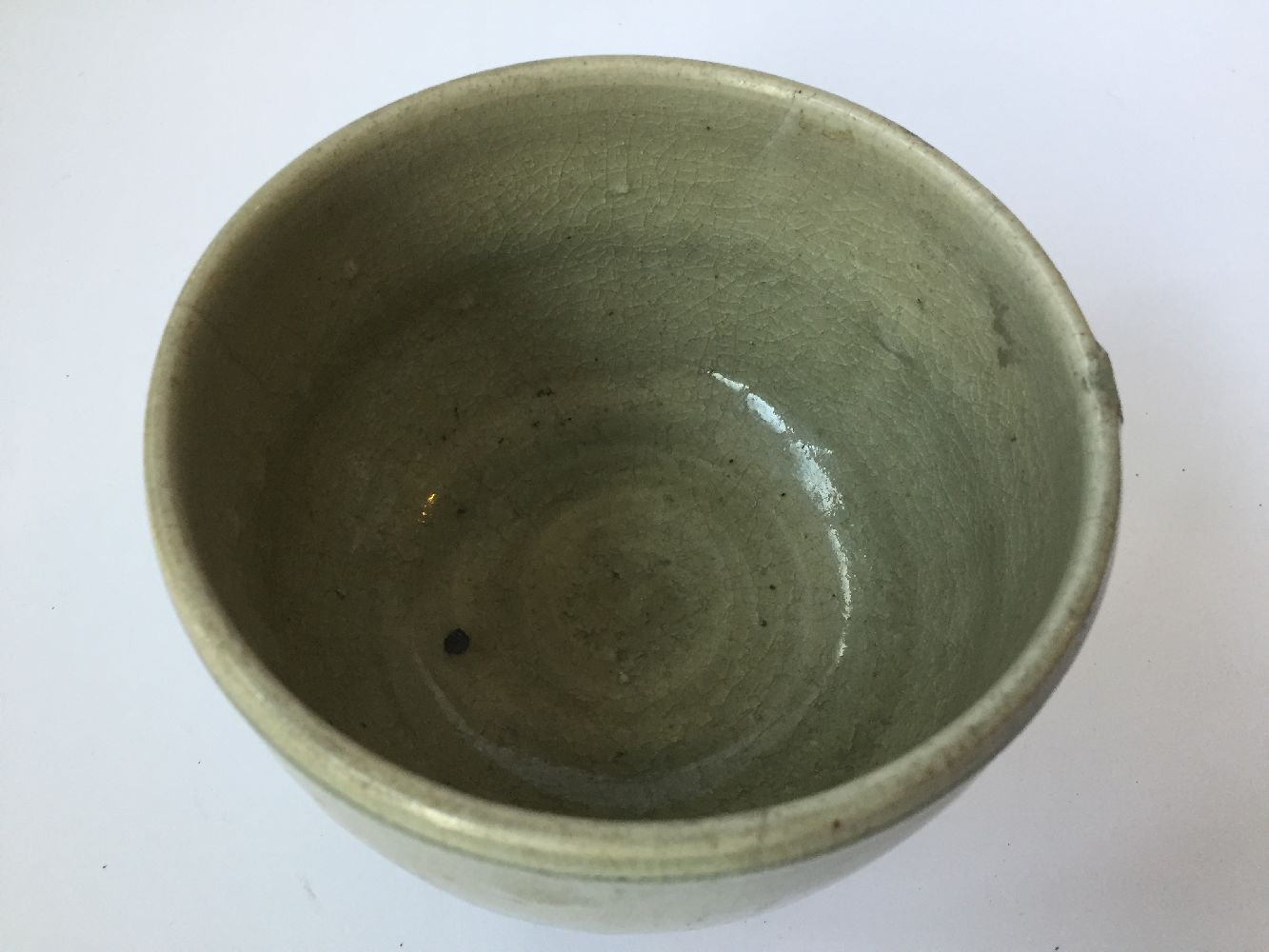 Three Thai Sawankhalok bowls, 15th-16th century, each covered in a celadon glaze, two with fluted - Image 23 of 27