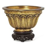 Property of a Gentleman (lots 36-85) A Sino-Tibetan gilt-bronze 'lotus' bowl, Qianlong mark and