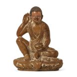 Property of a Gentleman (lots 36-85) A Tibetan carved hardstone figure of a monk, 18th/19th century,