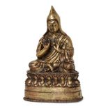 Property of a Gentleman (lots 36-85) A Tibeto-Chinese gilt copper alloy figure of Tsongkhapa, 18th/