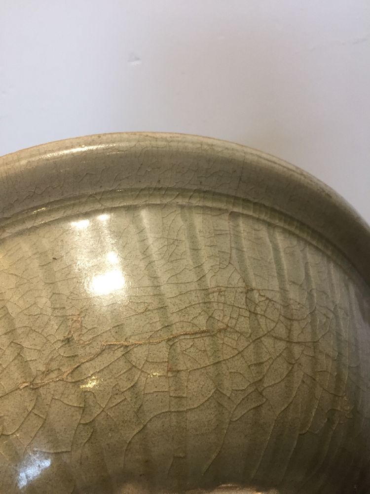 Two Thai Sawankhalok celadon pottery bowls, 15th century, one bowl decorated to the interior with an - Image 7 of 17