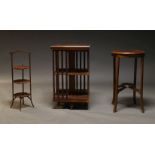 An Edwardian style walnut and inlaid revolving bookcase, second half 20th Century, with slatted