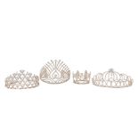 Three crystal tiaras and a small crystal fleur-de-lys design coronet; the tiaras comprising a