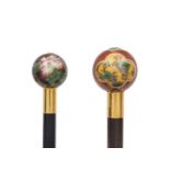 A pair of hardwood walking sticks with cloisonne pommel form handles, late 19th / early 20th