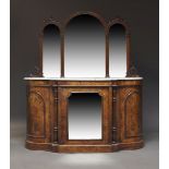 A Victorian walnut, inlaid and mirrored credenza, the shaped top with white Carrara marble top (