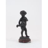 After Claude Michel (1738-1814), a French bronze model of a child, late 19th century, depicted
