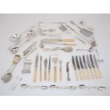 A group of silver and silver plated flatware including: a set of six Victorian silver coffee
