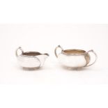 A silver cream jug and sugar bowl, London, c.1939, Goldsmiths and Silversmiths Co., both of