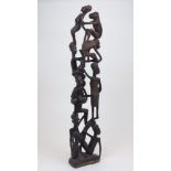 An African carved hardwood 'Tree of Life' sculpture, featuring male and female figures and