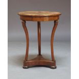 A Louis Philippe mahogany gueridon, the circular radial veneered top, above single frieze drawer