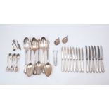 A small group of silver flatware comprising: a set of six Swedish silver table spoons, Gavle, c.