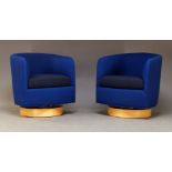 After Milo Baughman, a pair of 'Roxy' swivel armchairs, produced by Thayer Coggin, of recent