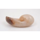 European School, mid-late 20th century- Shell Sculpture; pink alabaster, 38cm long, 15cm high,