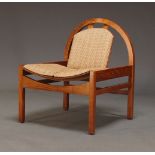 Baumann, France, an 'Argos' chair, c.1980, with stained beech frame and upholstered seat, on