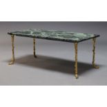 Attributed to Maison Bagués, a marble top and brass coffee table, c.1960, the rectangular