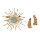 A pair of gold and diamond earclips and a blue zircon brooch, each earclip designed as a wing with