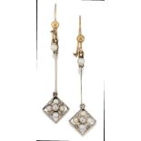 A pair of Edwardian diamond and seed pearl drop earrings, the square openwork drops with single-