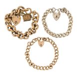 Two early 20th century gold curb link bracelets, the first with 9ct gold padlock clasp and a