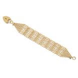 A 9ct gold gate link bracelet with 9ct gold padlock clasp, length 19.0cm, 28.9g Please refer to