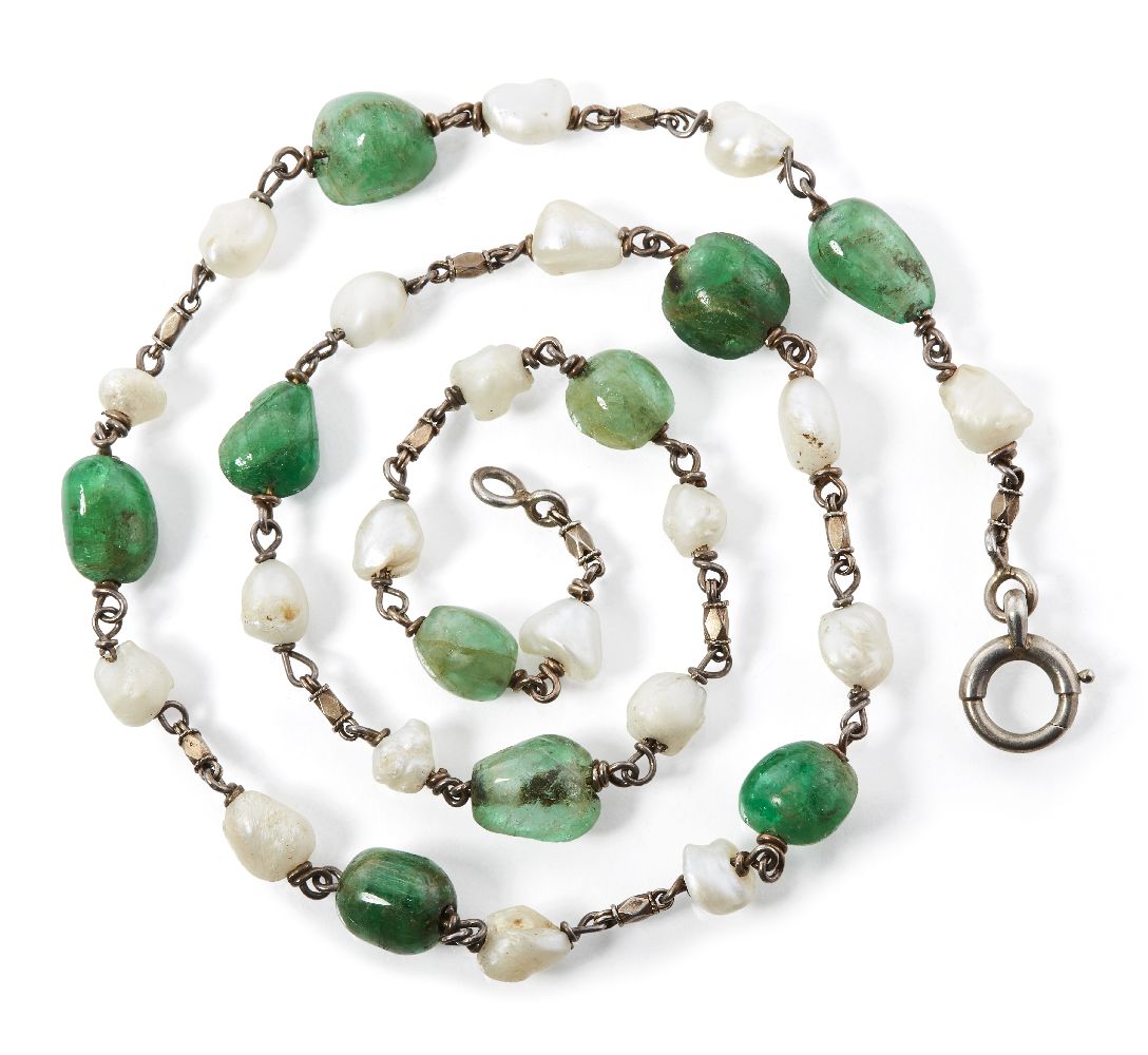 A South Indian emerald and pearl necklace, 19th century, with silver chain links between the