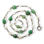 A South Indian emerald and pearl necklace, 19th century, with silver chain links between the