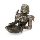 The upper section of a finely moulded brass figure of Meenakshi, the avatar of goddess Pavarti,