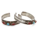 Two coral and turquoise set silver cuff bracelets, India, 20th century, each with three raised
