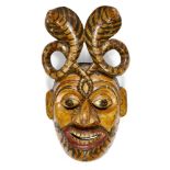 A South Indian papier mache wood dance mask, Kerala, India, late 19th-early 20th century, 31.5cm.