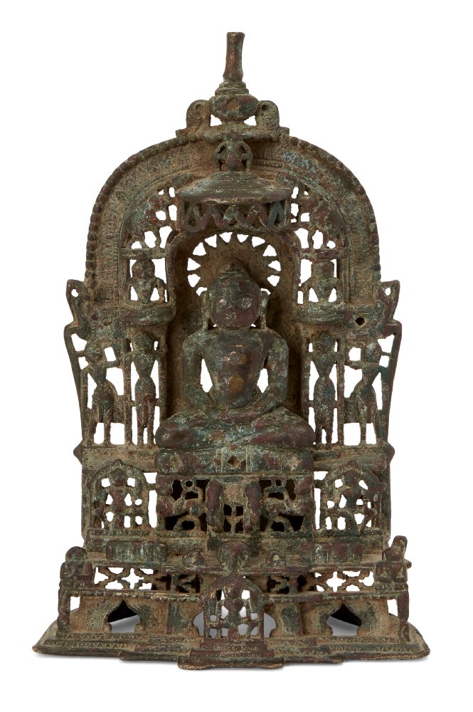 A Jain brass alter piece, Western India, 19th century, cast with a jina seated in meditation on a