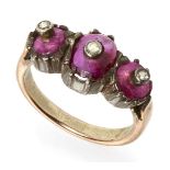 A ruby and diamond three-part ring, India, 19th- early 20th century, the rose gold ring with a