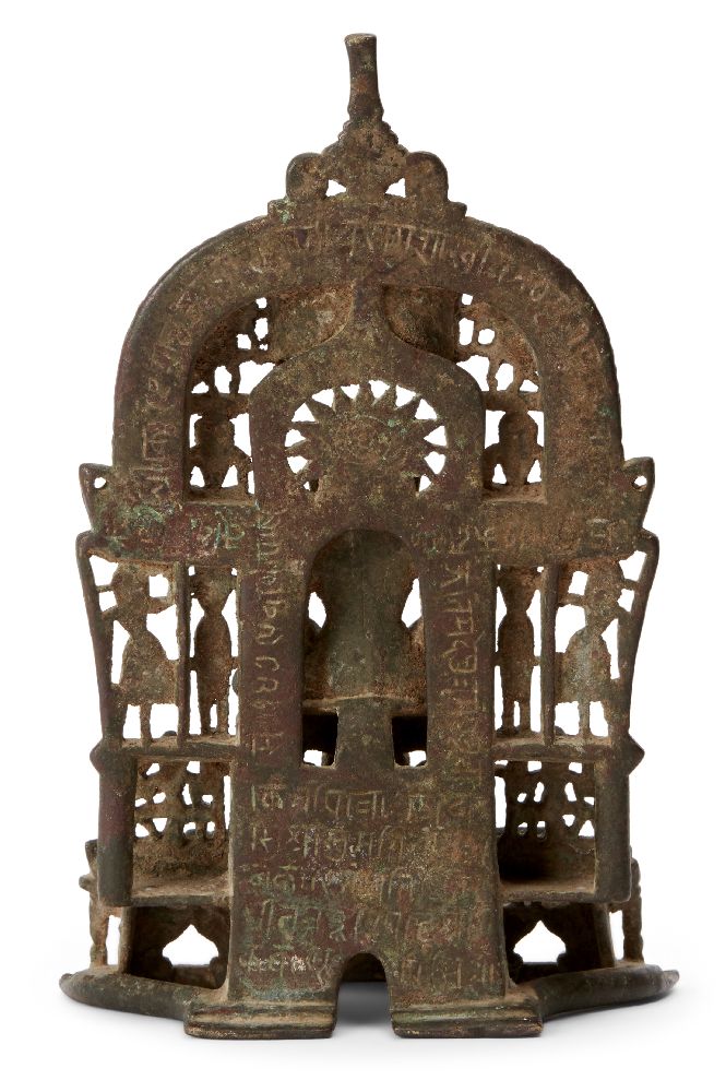 A Jain brass alter piece, Western India, 19th century, cast with a jina seated in meditation on a - Image 2 of 2