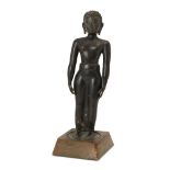 A Jain bronze figure of Tirthankara, South India, 17th century or earlier, on a flat, round base,