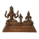 A Tamil Nadu copper figural group of Shiva, Parvati and Skanda (Somaskanda), South India, 19th