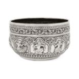 A silver repousse bowl with scenes from the Ramayana, India, 19th century, the silver spherical body