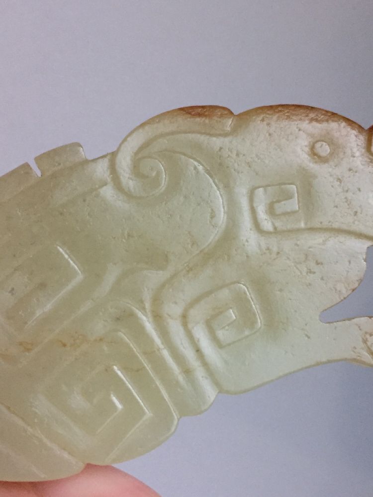 A rare Chinese yellow jade pendant, Western Zhou dynasty, carved as a stylised mythical beast with a - Image 10 of 11