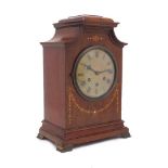 A German inlaid mahogany cased eight-day chiming mantel clock by Gustav Becker, early 20th