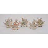 Five Art Deco menu stands, porcelain, 20th century, each with their own stylised dancing figure,