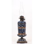 A Hinks & Son's blue glazed earthenware oil lamp, late 19th century, with foliate decoration