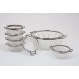 A twin-handled moulded glass bowl with silver plated stylised bamboo rim, together with six