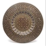 An Indian enamelled copper tray, late 19th century, of circular form with scalloped rim to the