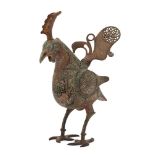 A Khorasan-style silver-inlaid bronze incense burner, 20th century, cast as a standing cockerel,