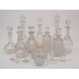 A collection of assorted clear glass decanters, 19th - early 20th century, the tallest 35cm high,