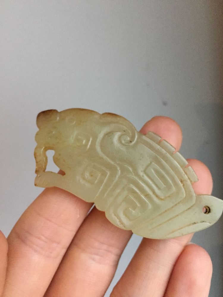 A rare Chinese yellow jade pendant, Western Zhou dynasty, carved as a stylised mythical beast with a - Image 5 of 11