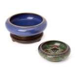 Two Chinese cloisonné enamel circular bowls, 20th century, the smaller bowl decorated with