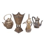 An Arabic 'dallah' coffee pot, marked '99/R.T, Silver' to base, the partially gilded body bearing