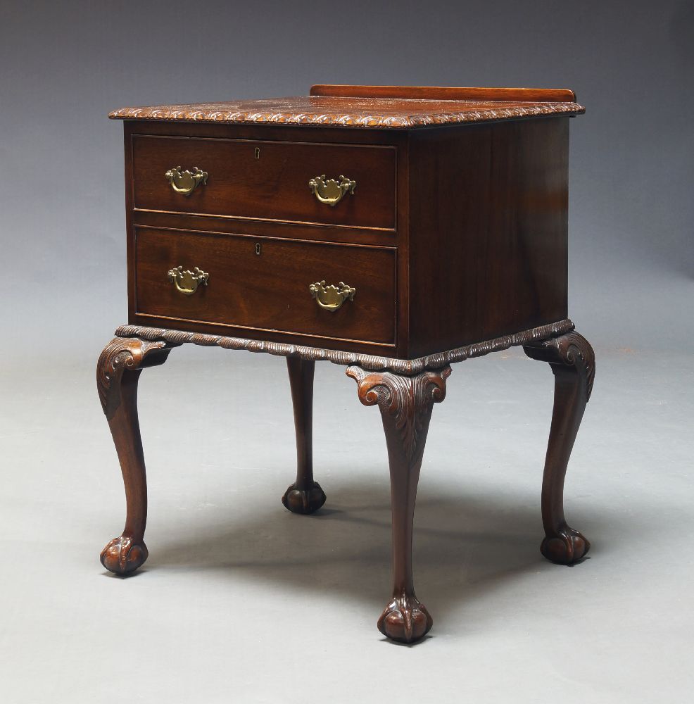 A mahogany side table in the Georgian taste, mid 20th Century, the rectangular top with acanthus