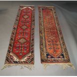 Two Turkish runners, with deep red fields, a pair of rugs with three medallions and two other rugs