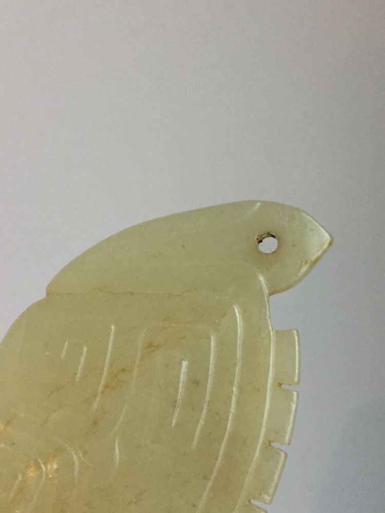 A rare Chinese yellow jade pendant, Western Zhou dynasty, carved as a stylised mythical beast with a - Image 11 of 11