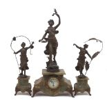A green onyx and spelter clock and garniture group, 20th Century, the case of architectural plinth