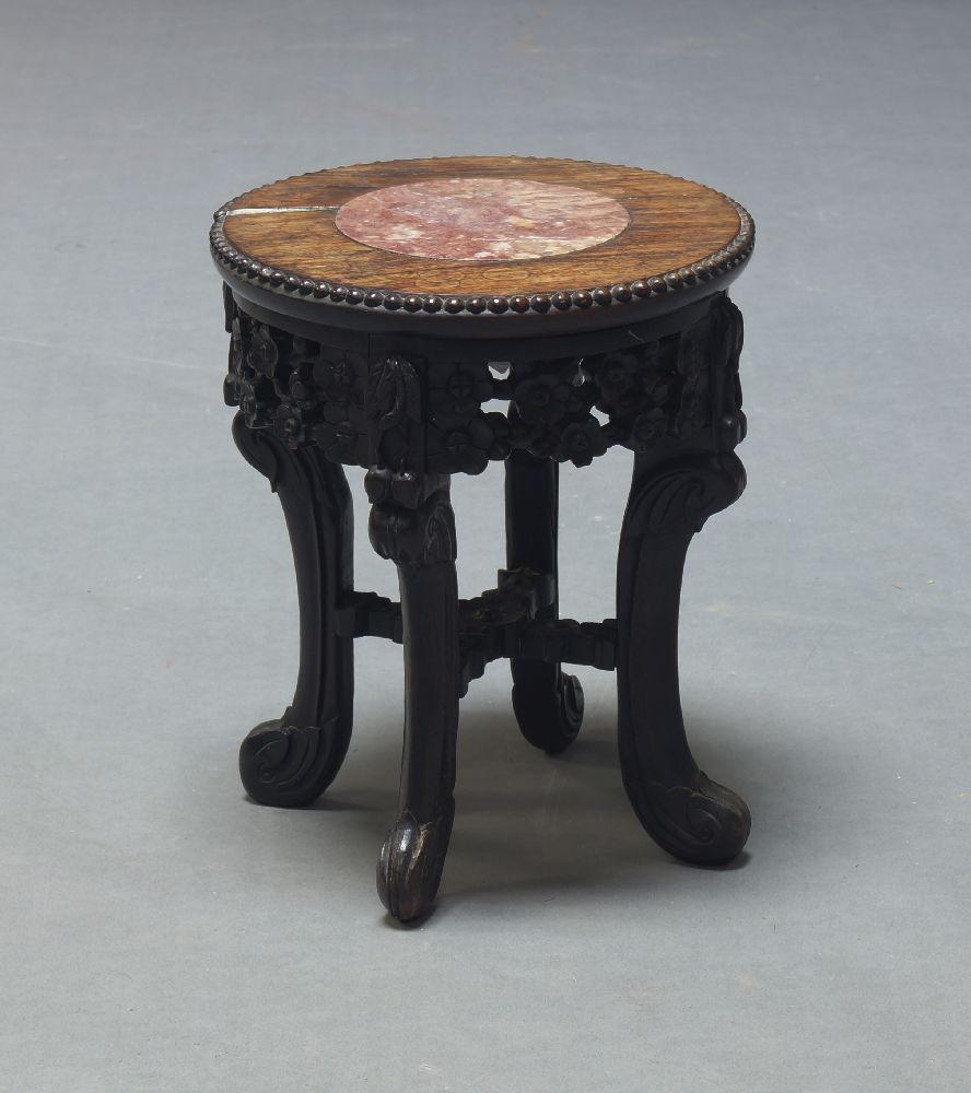 A Chinese marble inlaid low table, late 19th, early 20th Century, the circular top with inset with